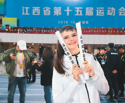 李曼在江西省第十五届运动会现场留影。